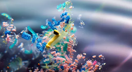 High-resolution image of microplastics floating in water.
