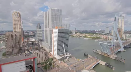 Some blue sky peeking through the clouds in Rotterdam, viewed from the Erasmus Bridge. 30 July 2025