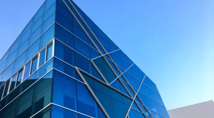 Stock image of a glass building on a sunny day