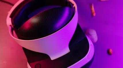 A virtual reality headset with snacks, potato chips and chocolate