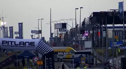 Formula 1 fans walk through Zandvoort to get to the entrance of Dutch Grand Prix on a rainy Saturday morning. 30 Aug. 2025