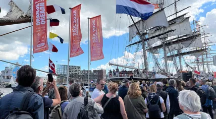 SAIL Amsterdam: People queuing on the quays of Amsterdam for their chance to board a tall ship, 21 August 2025