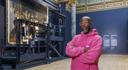 Director Steve McQueen in front of Rembrandt's The Night Watch, ahead of the Rijksmuseum screening of his 34-hour Occupied City documentary. September 2025
