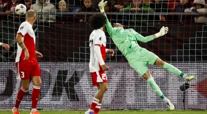 Tanner Tessmann of Olympique Lyonnais (not in picture) scores past FC Utrecht goalkeeper Vasilis Barkas for the 1-0 during the Europa League match between FC Utrecht and Olympique Lyon at Stadion Galgenwaard, on September 25, 2025, in Utrecht, Netherlands.”