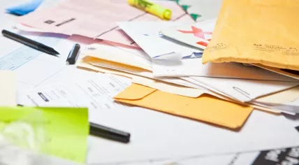 Different papers scattered on a table
