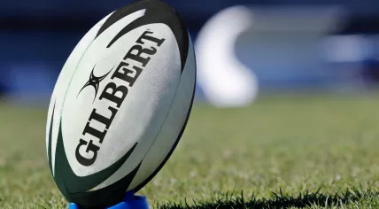 Rugby ball on a tee.