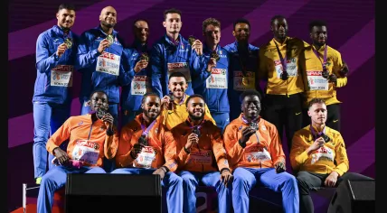 Dutch relay athletes Nsikak Ekpo, Taymir Burnet, Xavi Mo-Ajok, and Elvis Afrifa (in orange) alongside other runners at the 2024 relay event in Rome.