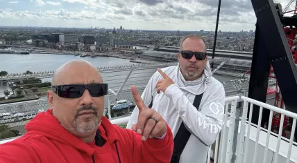 Owen Ramsingh with his friend Robert Olsen standing on the A'dam Toren rooftop in September 2025.