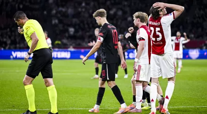 Referee Jeroen Manschot after a foul by Wout Weghorst of Ajax on Sven Mijnans of AZ Alkmaar during the Dutch Eredivisie match between AFC Ajax and AZ at the Johan Cruyff ArenA on October 18, 2025, in Amsterdam, the Netherlands.