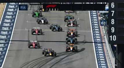 Red Bull Racing's Dutch driver Max Verstappen, winner of the pole position, leads the pack of drivers as the race begins during the United States Formula One Grand Prix at the Circuit of the Americas in Austin, Texas, on October 19, 2025.