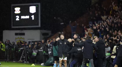 Players and staff celebrate the 2-1 victory after the UEFA Europa League match between Go Ahead Eagles and Aston Villa FC at De Adelaarshorst on October 23, 2025, in Deventer, the Netherlands.