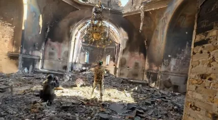 Dutch photojournalist Daphne Wesdorp amid the ruins in Kostiantynivka, Donetsk, Ukraine, after a Russian drone approached the scene. October 2025