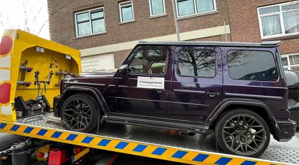 One of the cars being seized after three arrests were made for human trafficking in the Port of Rotterdam