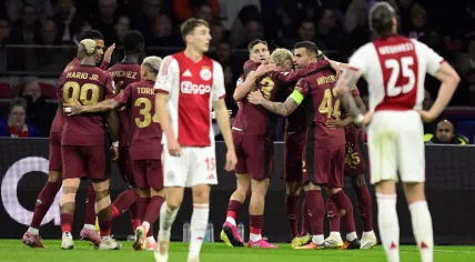 Galatasaray players celebrate the opening goal during the UEFA Champions League match between AFC Ajax and Galatasaray SK at the Johan Cruijff ArenA in Amsterdam, the Netherlands, on November 5, 2025.