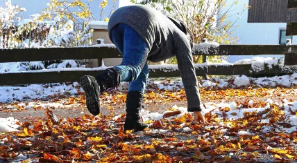 A person almost slipped on an icy autumn road