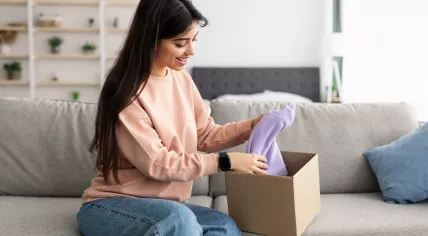 Unpacking an online purchase.