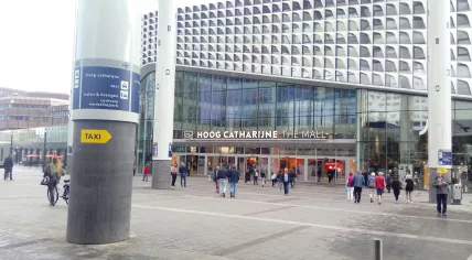 People walk in and out of Hoog Catharijne mall in Utrecht.