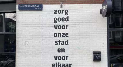 Take good care of our city, and of each other,” a statement written by Amsterdam Mayor Eberhart van der Laan in a farewell letter to the city before his death, as seen in street art in Amsterdam-Oost. 2025