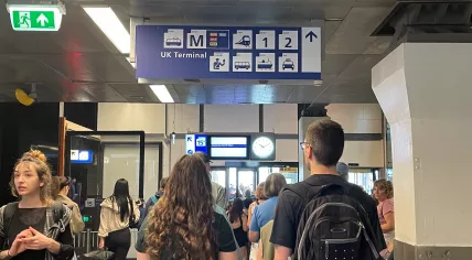 Passengers walking towards the UK Terminal and high-speed trains rail platforms at Amsterdam’s Central Station. 2 May 2025