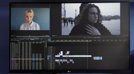 Still image from Synthetic Sincerity, a 2025 documentary by Marc Isaacs, featuring Illinca Manolache as an AI avatar, and Lynn El-Safah as an AI researcher