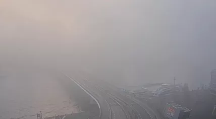 A barely visible Erasmus Bridge on a foggy morning in Rotterdam, 5 December 2025