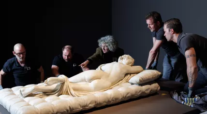 Workers gathered around the "Sleeping Hermaphroditus", which will be displayed at the Rijksmuseum on loan from the Louvre starting Feb. 6.
