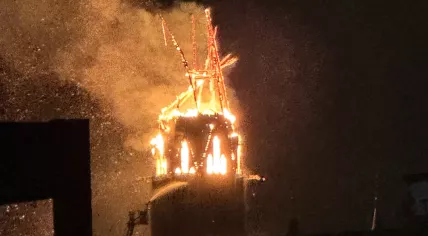 Fire engulfs the Vondelkerk shortly after midnight during New Year's celebrations in Amsterdam. 1 Jan. 2026