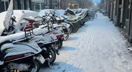 Snow and ice covers a side street in Amsterdam’s De Pijp neighborhood. 7 Jan. 2026