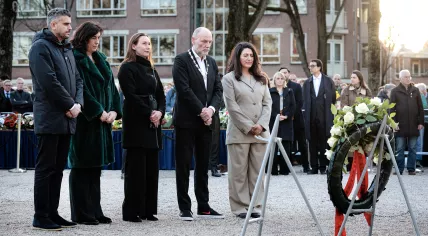 Aldermen Sofyan Mbarki, Hester van Buren, Zita Pels, Rutger Groot Wassink, and Touria Meliani lay flowers during the commemoration of the February Strike of 1941 at the Dokwerker in Amsterdam. The event is organized jointly by the Committee for the Commemoration of the February Strike 1941 and the City of Amsterdam.