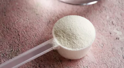 A scoop of peptide powder