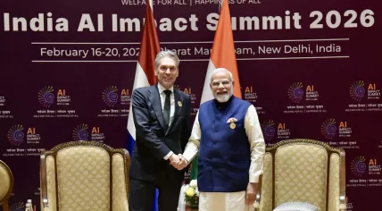 Schoof and Prime Minister Narendra Modi at the AI Summit in India, February 19, 2026.