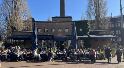 A full terrace outside of a cafe on the Javaplein, Indische Buurt, Amsterdam, February 25, 2026.