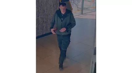 Anne D., a convicted sex offender who escaped custody, seen in footage captured near an ATM. 30 March 2026