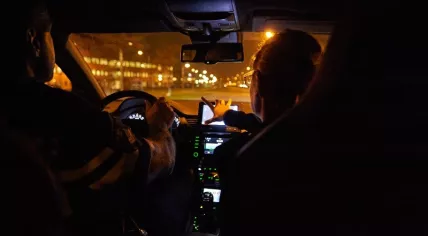 Police officers in their car.