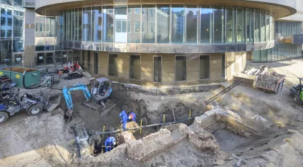 Archaeologists uncover the medieval foundations of the Spuipoort at the Binnenhof in The Hague on February 12, 2024.