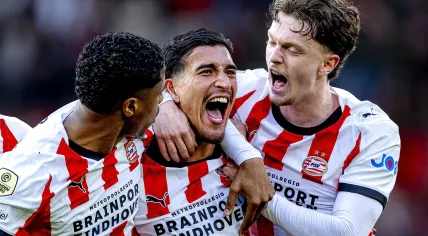 PSV Eindhoven player Couhaib Driouech scores to make it 4–3 and celebrates his goal during the Dutch VriendenLoterij Eredivisie match between PSV and FC Utrecht at the Philips Stadion on April 4, 2026, in Eindhoven, Netherlands.