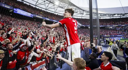 Wouter Goes, Kees Smit and Alexandre Penetra of AZ celebrate the 5–1 victory in the KNVB Cup final between AZ and NEC at De Kuip on April 19, 2026, in Rotterdam, Netherlands.