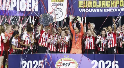 PSV players celebrate with the championship trophy after the Women’s Eredivisie match between PSV and ADO Den Haag at TenCate Stadion De Herdgang on May 8, 2026, in Eindhoven, the Netherlands.