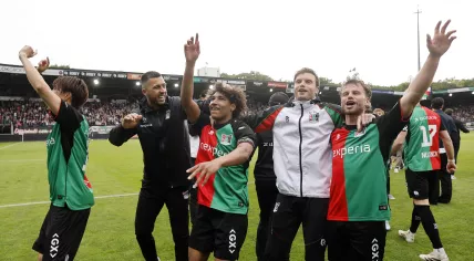 Noe Lebreton of NEC Nijmegen and Dirk Proper of NEC Nijmegen celebrate qualifying for European football during the Dutch Eredivisie match between NEC Nijmegen and Go Ahead Eagles at De Goffert on May 17, 2026, in Nijmegen, the Netherlands.