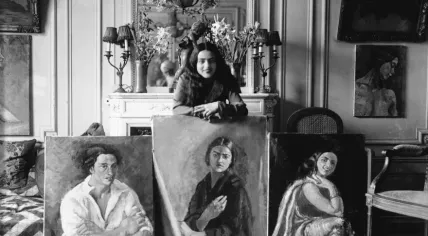 Amrita Sher-Gil with three of her paintings in Paris, 1930. Photo taken by her father in their apartment