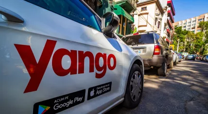 A car with the Yango logo parked on a street in Bucharest, Romania, September 9, 2019.