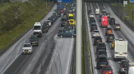 Paramedics respond to a crash during a hailstorm on the westbound A12 near Maarsbergen, Utrecht. 13 May 2026