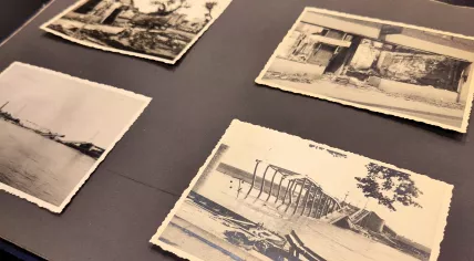 Photo album showing WWII damage in various Dutch cities, found in a box containing papers of resistance fighter Wim Oosenbrug in the Royal Library warehouse. Discovery announced on 4 May 2026