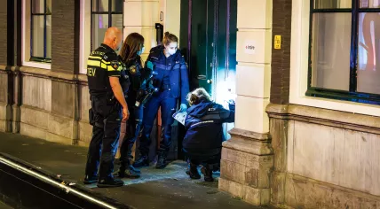 Police investigate a firebomb attack on the D66 party headquarters in The Hague, 7 May 2026