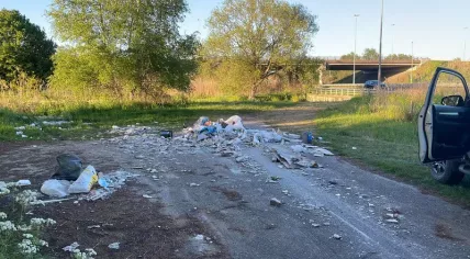 Bathroom renovation waste, including a toilet, sink and tiles, is seen dumped in the Moerenburg nature area near Tilburg, Netherlands. May 4, 2026