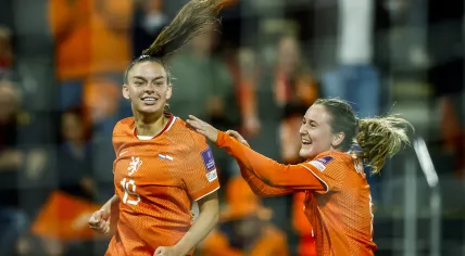 Romée Leuchter and Wieke Kaptein of the Netherlands celebrate the 2-0 goal during the Women's World Cup qualifying match between the Netherlands and Poland at Erve Asito Stadium in Almelo, the Netherlands, on June 9, 2026.