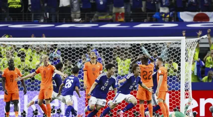 Koki Ogawa celebrates Japan's 2-2 equalizer as (left to right) Jan Paul van Hecke, Virgil van Dijk and Denzel Dumfries react during the FIFA World Cup 2026 Group F match between the Netherlands and Japan at Dallas Stadium in Arlington, United States, on June 14, 2026.