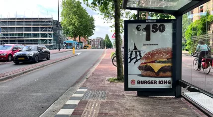 Burger King's 'Veggie Burger' ad at a bus station in Amsterdam. June 4, 2026.