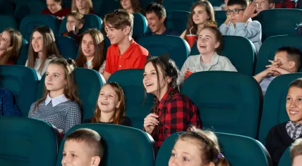 Kids at a theater. 