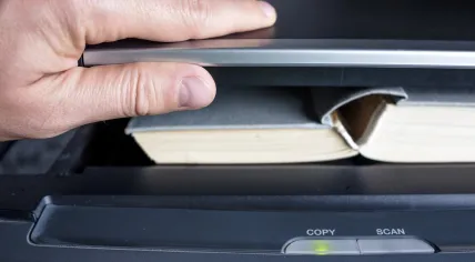 Scanning a book.